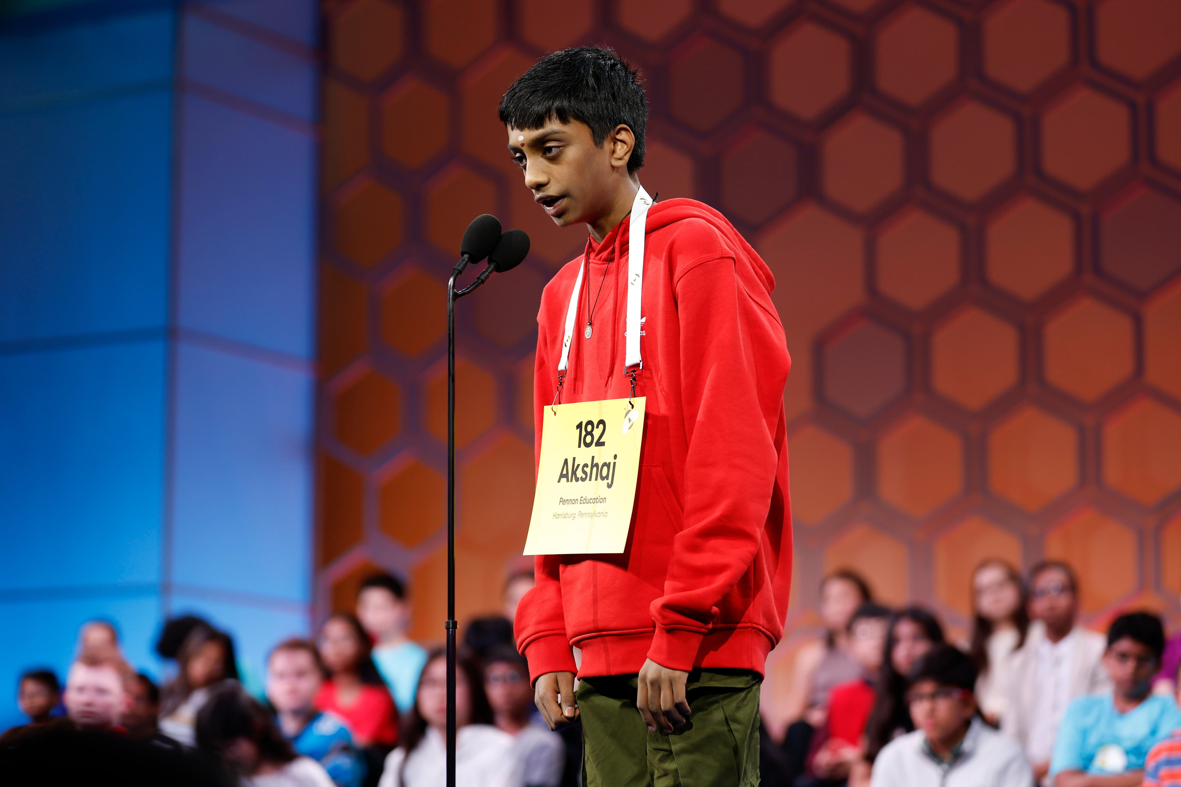 Akshaj Somisetty, 13, of Harrisburg, Pa., competes in the finals of the Scripps National Spelling Bee in National Harbor, Md., on Thursday, May 29, 2025. (Ting Shen/The New York Times)