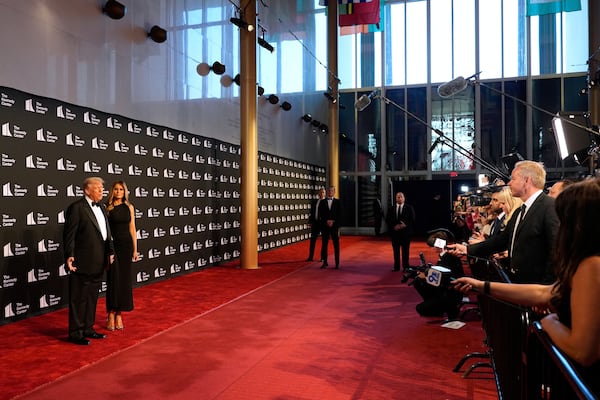 President Donald Trump and first lady Melania Trump arrive to view opening night of "Les Miserables," at the Kennedy Center, Wednesday, June 11, 2025, in Washington. (AP Photo/Alex Brandon)