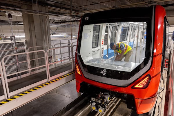 A worker aboard a new Plane Train car at Hartsfield-Jackson Atlanta International Airport's maintenance facility in Atlanta on Wednesday.