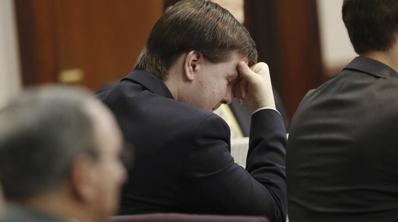 Leanna Taylor cries as attorney Maddox Kilgore shows photographs of her son Cooper to the jury during the murder trial for her ex-husband, Justin Ross Harris, in Brunswick on Monday. (AP Photo/John Bazemore, Pool)