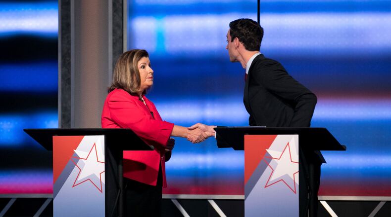 Republican Karen Handel and Democrat Jon Ossoff at the first 6th District debate. (Branden Camp/Atlanta Journal-Constitution via AP)