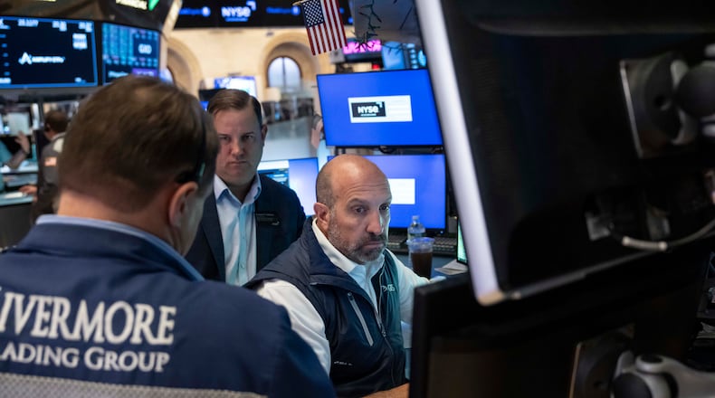 Specialist James Denaro works on the floor of the New York Stock Exchange, Thursday, Aug. 27, 2026, in New York. (AP Photo/Yuki Iwamura)