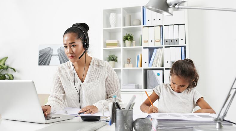 Workplaces rarely have a set policy on bringing kids to offices, but one expert says it can’t hurt to ask. (Fotolia)