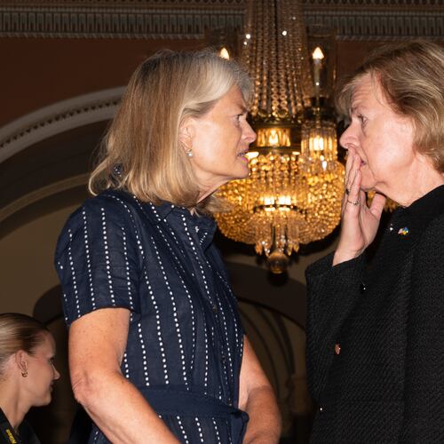 Sen. Lisa Murkowski, R-Alaksa, talks with Sen. Tammy Baldwin, D-Wis., at the U.S. Capitol, Tuesday, July 28, 2026, in Washington. (AP Photo/Allison Robbert)
