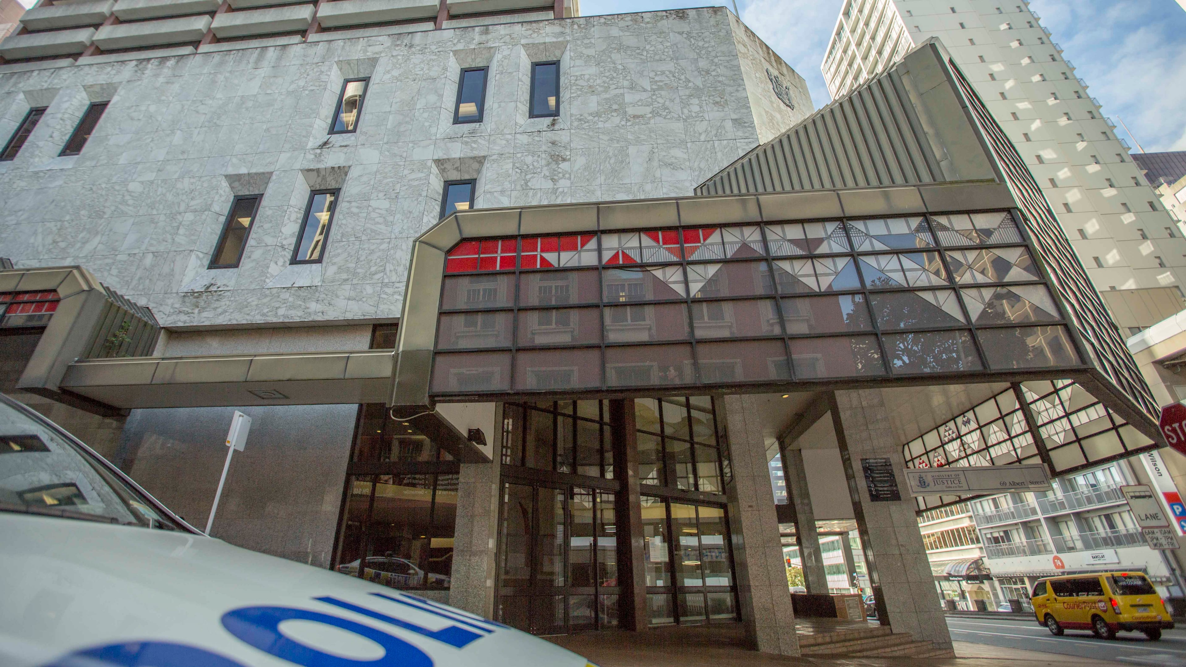 A police car is parked outside the Auckland District Court in Auckland, New Zealand, Aug. 17, 2015. (Bevan Read/Fairfax NZ/STUFF via AP)