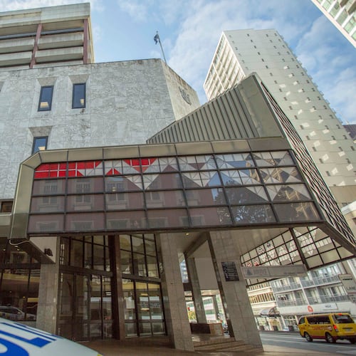 A police car is parked outside the Auckland District Court in Auckland, New Zealand, Aug. 17, 2015. (Bevan Read/Fairfax NZ/STUFF via AP)