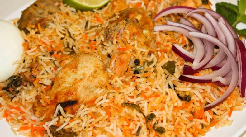 A Hyderabadi dum chicken biryani dish. Hot Breads failed its Oct. 3 restaurant inspection after being cited for dirty dishes piled in the sinks and debris build-ups along the kitchen floors and walls.