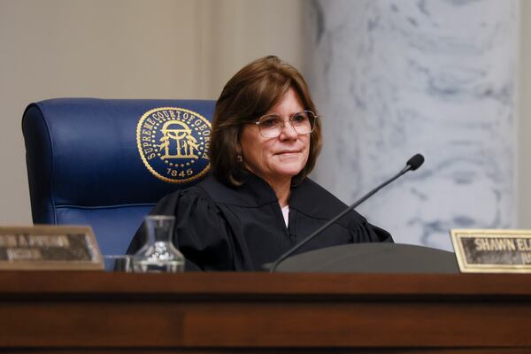 Georgia Supreme Court Justice Shawn LaGrua, pictured during oral arguments in June, opposed her colleagues' decision to transfer most murder cases to the Georgia Court of Appeals. (Jason Getz/AJC)