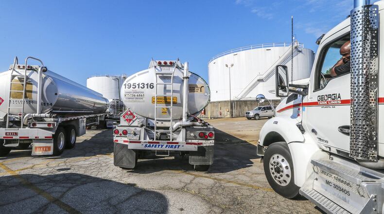 Tanker trucks are shown on September 16, 2016 at the Kinder Morgan terminal in Doraville where gasoline is distributed from the Colonial pipeline. Prices jumped this week because of the prospect of tight supply stemming from a pipeline leak in Alabama. JOHN SPINK /JSPINK@AJC.COM