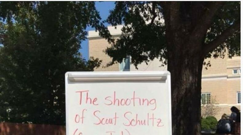 A sign outside the Tate Student Center at UGA about the shooting death of Georgia Tech student Scout Schutz struck some students as offensive.