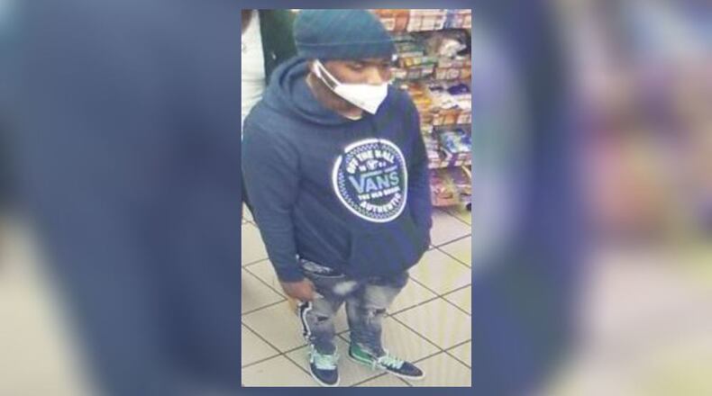 Atlanta police are looking to identify a man accused of robbing two women at gunpoint last month.