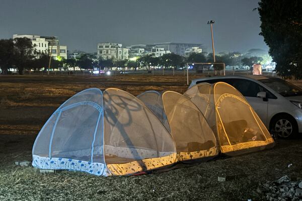 Local residents rest near their mosquito nets on a road in the aftermath of Friday's earthquake in Mandalay, Myanmar, Tuesday, April 1, 2025. (AP Photo)