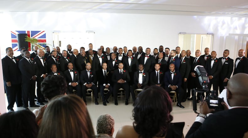 The newly inducted class of 100 Black Men of Atlanta poses for a group portrait at organization’s 2018 Gala early this month at Bentley Atlanta in Alpharetta. (Casey Sykes for The Atlanta Journal-Constitution)