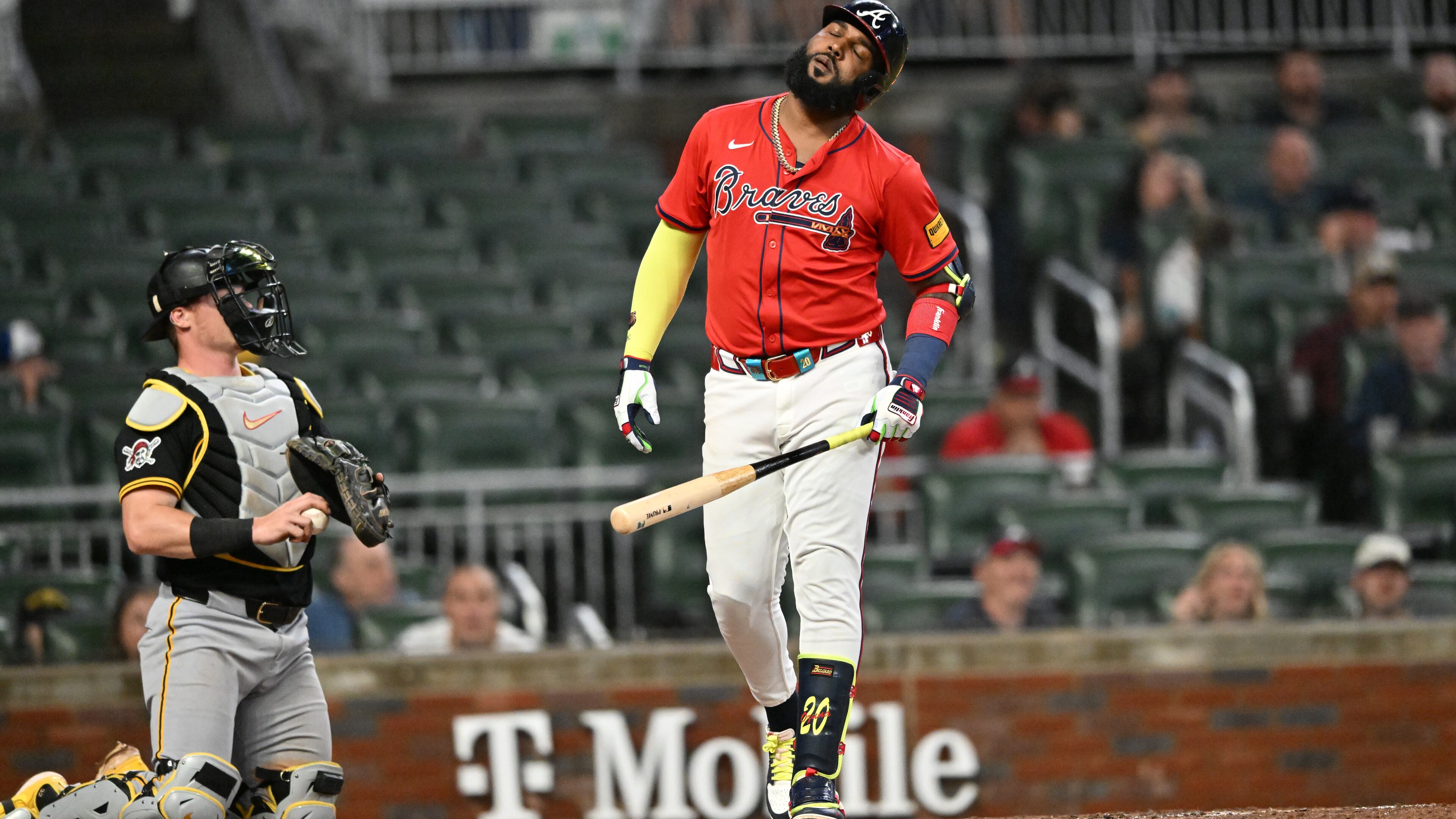 Atlanta Braves designated hitter Marcell Ozuna (center) reacts after striking out in the eighth inning of a baseball game at Truist Park, Friday, Sept. 26, 2025, in Atlanta. The Pittsburgh Pirates won 9-3 over Atlanta Braves. (Hyosub Shin/AJC)
