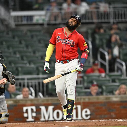 Atlanta Braves designated hitter Marcell Ozuna (center) reacts after striking out in the eighth inning of a baseball game at Truist Park, Friday, Sept. 26, 2025, in Atlanta. The Pittsburgh Pirates won 9-3 over Atlanta Braves. (Hyosub Shin/AJC)