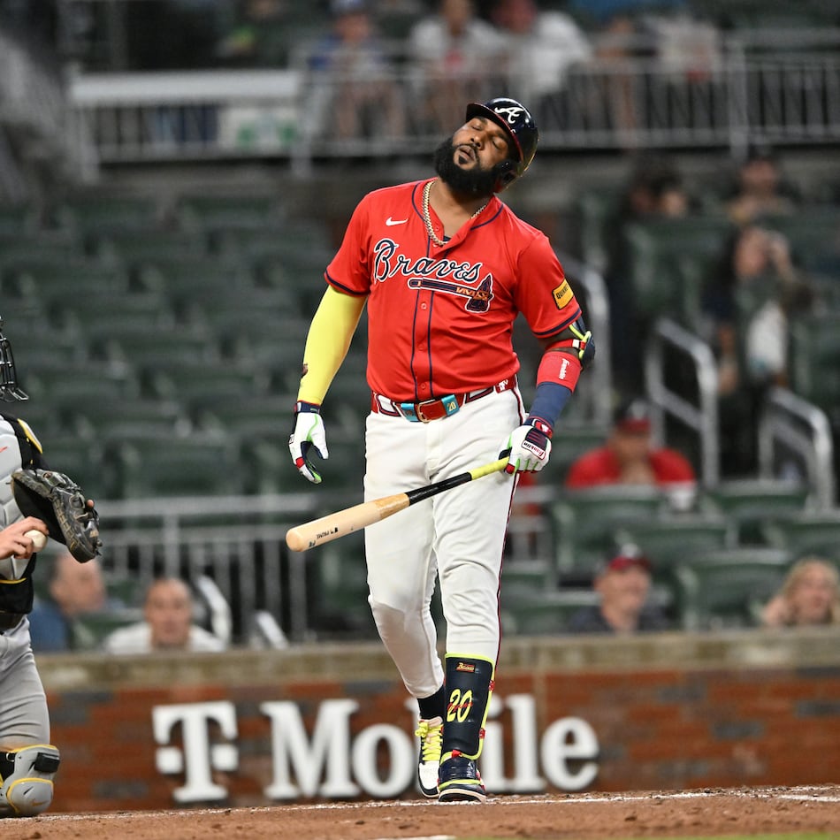 Atlanta Braves designated hitter Marcell Ozuna (center) reacts after striking out in the eighth inning of a baseball game at Truist Park, Friday, Sept. 26, 2025, in Atlanta. The Pittsburgh Pirates won 9-3 over Atlanta Braves. (Hyosub Shin/AJC)