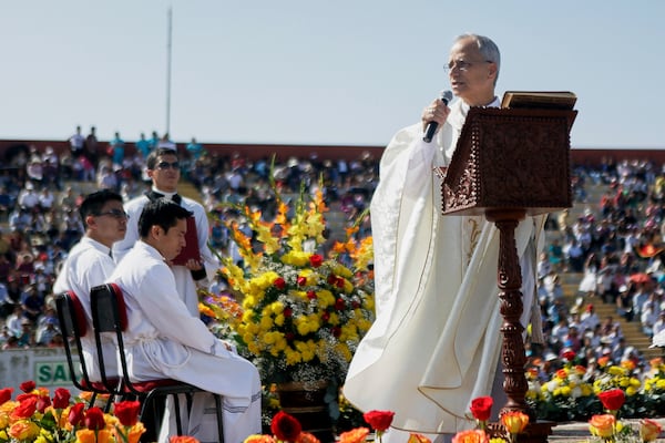 Pope Leo XIV, then Apostolic Administrator of Chiclayo Robert Prevost, preaches during a Corpus Christi celebration in a stadium in Chiclayo, Peru, Friday, June 19, 2015. (AP Photo/Julio Reano)