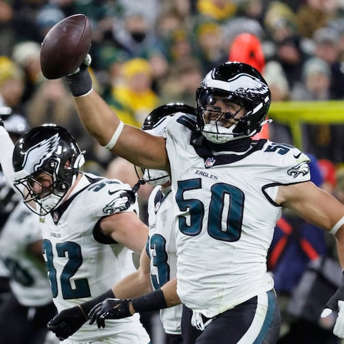 Philadelphia Eagles linebacker Jaelan Phillips (50) celebrates a fumble recovery against the Green Bay Packers during the first half of an NFL football game Monday, Nov. 10, 2025, in Green Bay, Wis. (AP Photo/Mike Roemer)