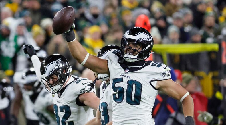 Philadelphia Eagles linebacker Jaelan Phillips (50) celebrates a fumble recovery against the Green Bay Packers during the first half of an NFL football game Monday, Nov. 10, 2025, in Green Bay, Wis. (AP Photo/Mike Roemer)