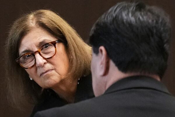 Judge Victoria A. Rossetti, left, listens to defense attorney Gregory Ticsay during the sentencing hearing for Robert E. Crimo III., at the Lake County Courthouse, in Waukegan, Ill., Wednesday, April 23, 2025, after pleading guilty in March to killing seven people and injuring dozens more when he opened fire on a 2022 Independence Day parade in Highland Park, Ill. (AP Photo/Nam Y. Huh, Pool)