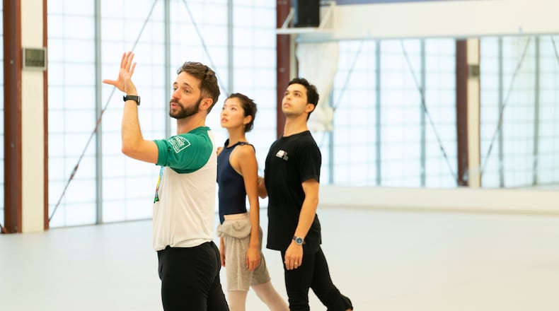 Répétiteur Michael Breeden rehearses Atlanta Ballet's Fuki Takahashi and Sergio Masero in Justin Peck's "In Creases." (Photo by Daniel Solberg)