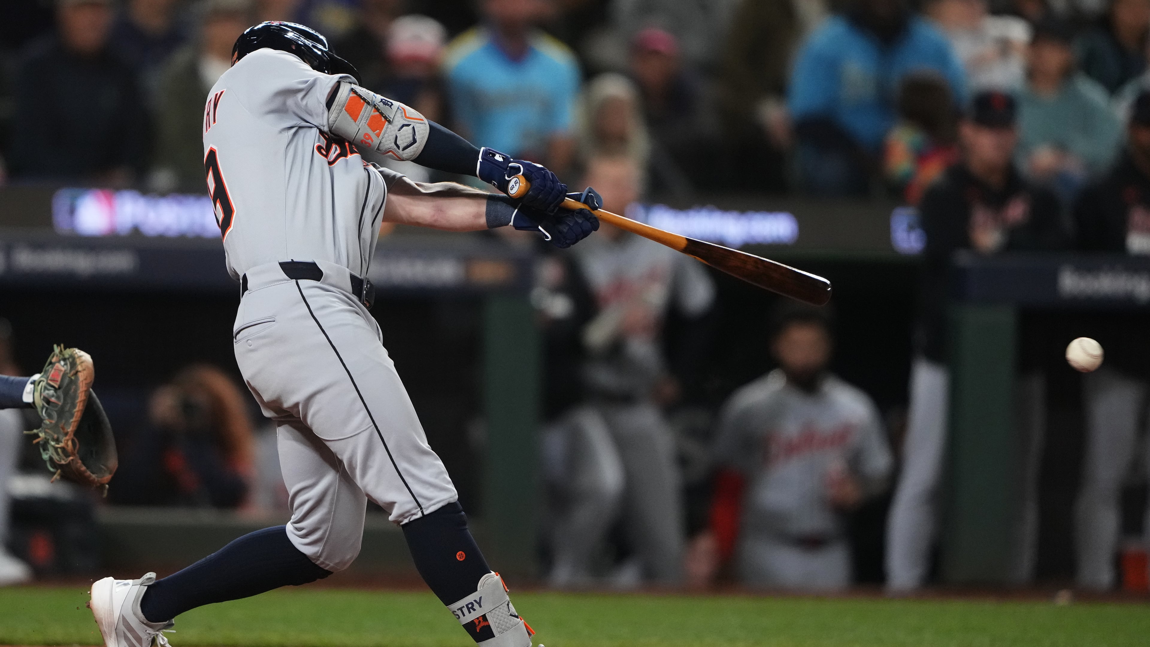 Detroit Tigers' Zach McKinstry hits a single to score Spencer Torkelson for the go-ahead run during the 11th inning in Game 1 of baseball's American League Division Series against the Seattle Mariners, Saturday, Oct. 4, 2025, in Seattle. (AP Photo/Lindsey Wasson)