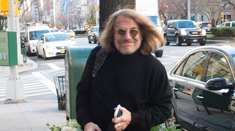 In a December 2015 file image, Dr. Harold Bornstein, the one-time personal physician to Donald Trump, arrives at his New York office.