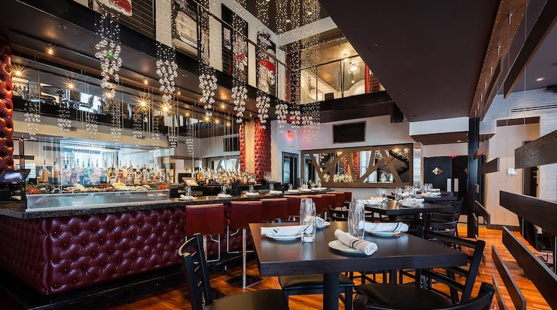 The first-floor bar and dining room at Simon’s Restaurant in Midtown. CONTRIBUTED BY CHRISTOPHER WATKINS