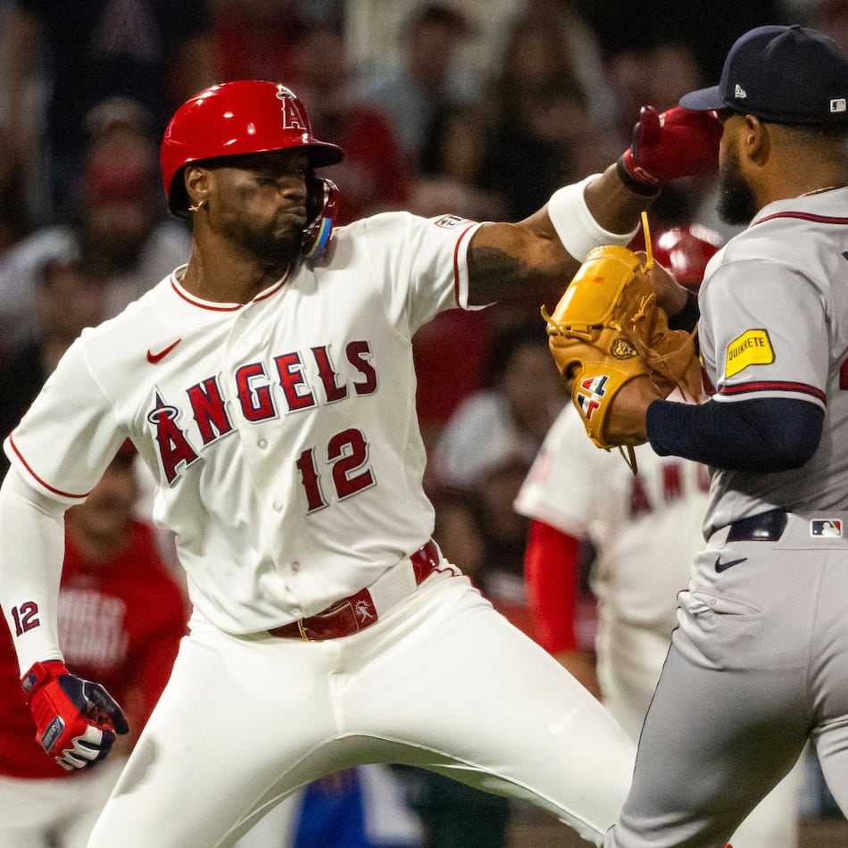 Angels designated hitter Jorge Soler (left) and Braves pitcher Reynaldo López fight during the fifth inning on Tuesday, April 7, 2026, in Anaheim, Calif. Both players were ejected from the game. (Ethan Swope/AP)