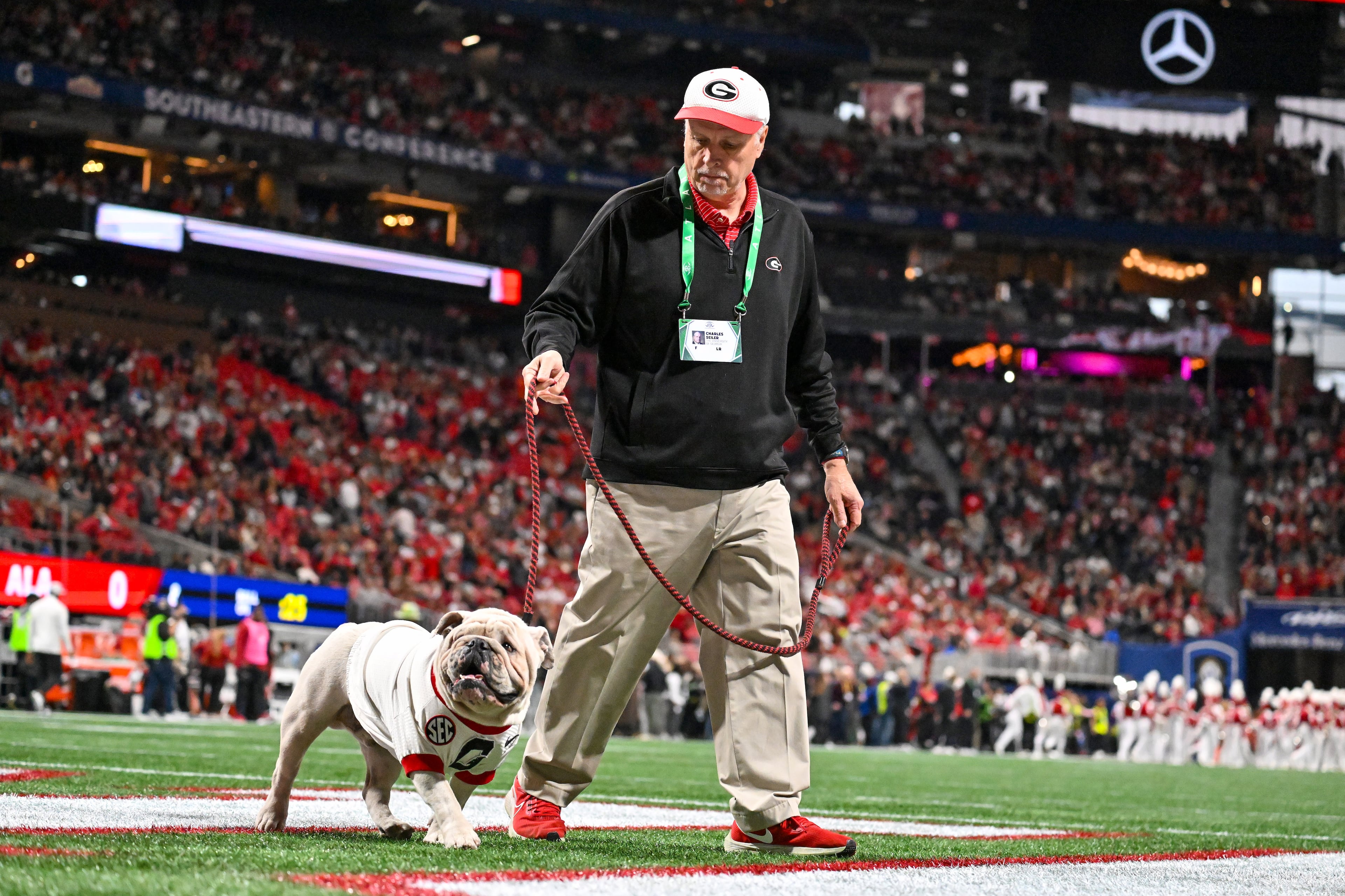Georgia mascot Uga X walks the field during the SEC Championship game against Alabama at Mercedes-Benz Stadium, Saturday, Dec. 6, 2025, in Atlanta. (Hyosub Shin / AJC)