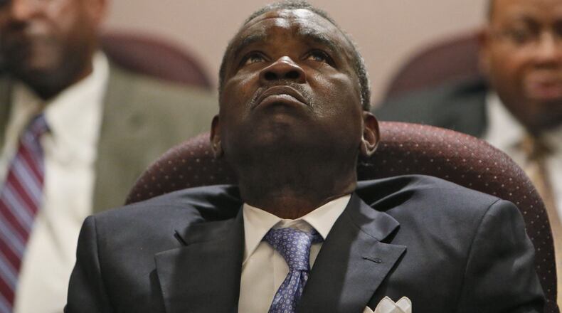 Feb. 18, 2014 - Atlanta - Arthur Ferdinand leans back in his chair as the 10 A.M. hearing continues into the afternoon. Fulton County Tax Commissioner Arthur Ferdinand appears at a Fulton County Board of Ethics hearing concerning allegations that he gave Atlanta’s mayor special treatment on late tax bills. BOB ANDRES / BANDRES@AJC.COM