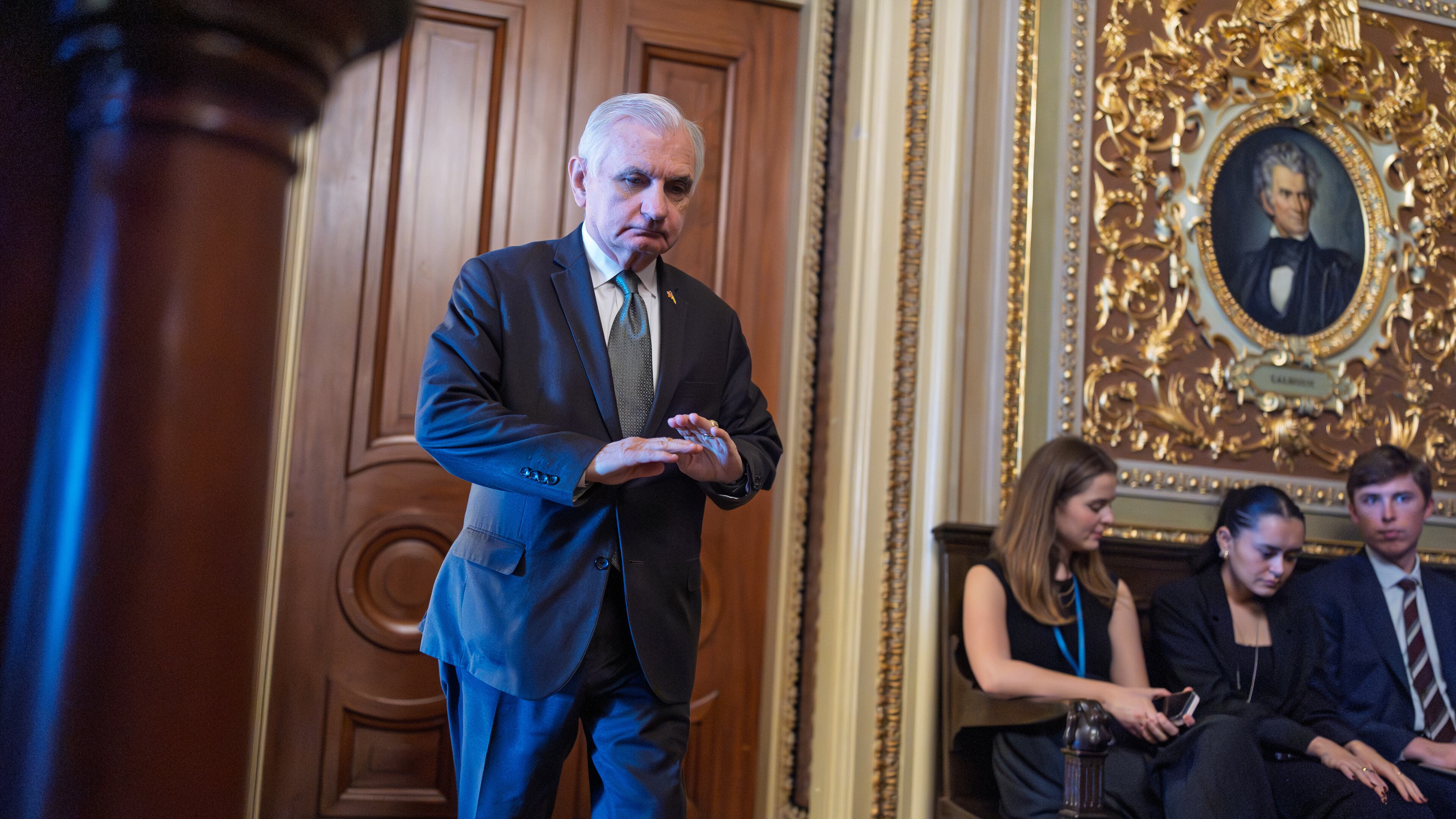Sen. Jack Reed, D-R.I., leaves a meeting room where he and other Senate Democrats at the Capitol are looking for a solution to the spending impasse, in Washington, Thursday, Nov. 6, 2025, day 37 of the government shutdown. (AP Photo/J. Scott Applewhite)