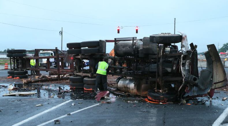 According to the state Department of Transportation, two trucks and a smaller vehicle crashed just before 6 a.m. at the junction of Ga. 316 and Ga. 20 near Lawrenceville.
