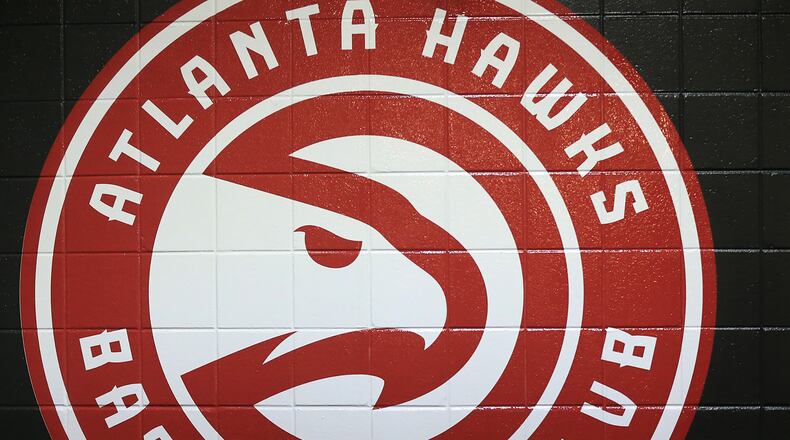 102715 ATLANTA: -- A new Hawks logo is painted on the tunnel wall leading out to the court for the first regular season basketball game "home opener" on Tuesday, Oct. 27, 2015, in Atlanta.  Curtis Compton / ccompton@ajc.com