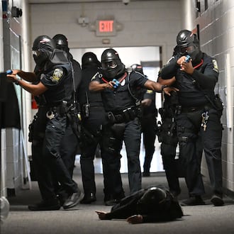 Atlanta Public Schools’ new tactical team conducts a training scenario demonstration for members of the media at Atlanta Public Schools’ Brewer Training Center on Tuesday, July 21, 2026, in Atlanta. Atlanta Public Schools is adding two new units to its security apparatus to keep students and employees safe: a tactical team and a drone team. (Hyosub Shin/AJC)