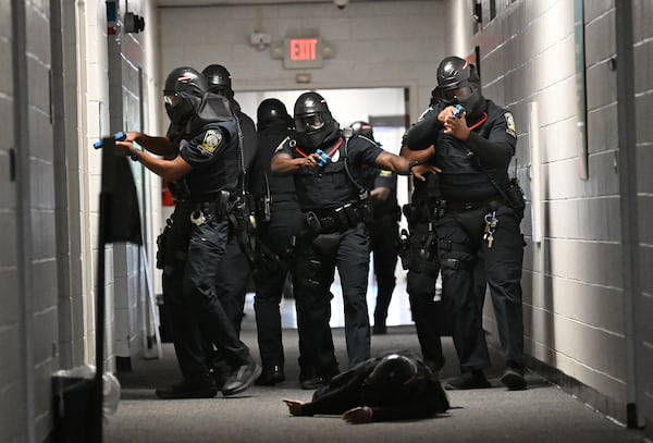 Atlanta Public Schools’ new tactical team conducts a training scenario demonstration for members of the media at APS’s Brewer Center on Tuesday, July 21, 2026, in Atlanta. (Hyosub Shin/AJC)