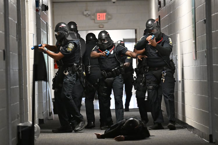 Atlanta Public Schools’ new tactical team conducts a training scenario demonstration for members of the media at Atlanta Public Schools’ Brewer Training Center on Tuesday, July 21, 2026, in Atlanta. Atlanta Public Schools is adding two new units to its security apparatus to keep students and employees safe: a tactical team and a drone team. (Hyosub Shin/AJC)