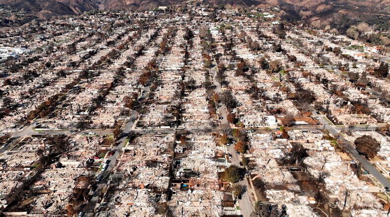 FILE - The devastation from the Palisades Fire is shown in an aerial view of the Pacific Palisades neighborhood of Los Angeles, Monday, Jan. 27, 2025. (AP Photo/Jae C. Hong, File)