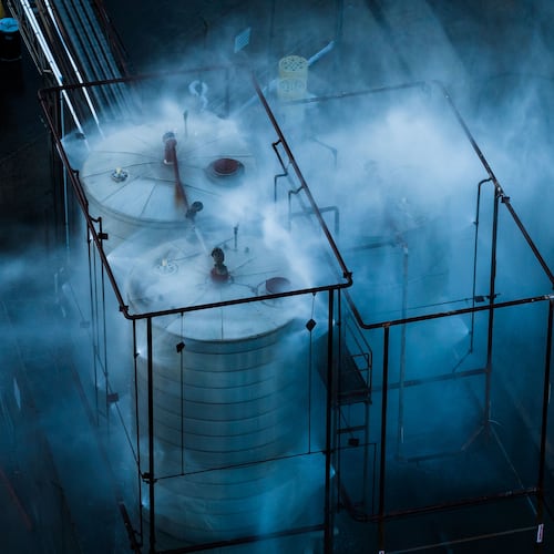 Water is sprayed on a tank that overheated at an aerospace plant in Garden Grove, Calif., Friday, May 22, 2026. (AP Photo/Ethan Swope)