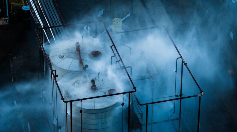 Water is sprayed on a tank that overheated at an aerospace plant in Garden Grove, Calif., Friday, May 22, 2026. (AP Photo/Ethan Swope)