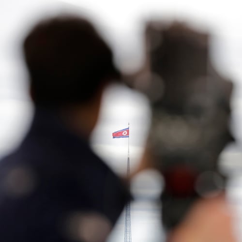 FILE - A North Korean flag flutters in the wind atop a 160-meter tower in North Korea's village Gijungdong as seen from the Taesungdong freedom village inside the demilitarized zone in Paju, South Korea on April 24, 2018. (AP Photo/Lee Jin-man, File)