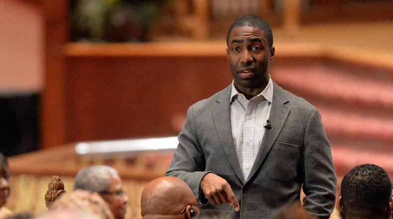NOVEMBER 21, 2014 DECATUR Interim DeKalb County CEO Lee May talks with over 1,000 county employees in a meeting Friday afternoon. KENT D. JOHNSON/KDJOHNSON@AJC.COM Interim DeKalb County CEO Lee May talks with over 1,000 county employees in a Nov. 21 meeting. (KENT D. JOHNSON/KDJOHNSON@AJC.COM)