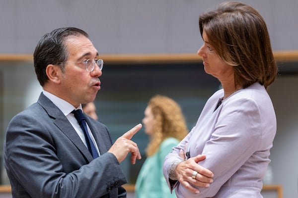 Spain's Foreign Minister Jose Manuel Albares Bueno, left, talks with Slovenia's Foreign Minister Tanja Fajon during the EU foreign ministers meeting at the EU Council building in Brussels, Tuesday, July 15, 2025. (AP Photo/Geert Vanden Wijngaert)