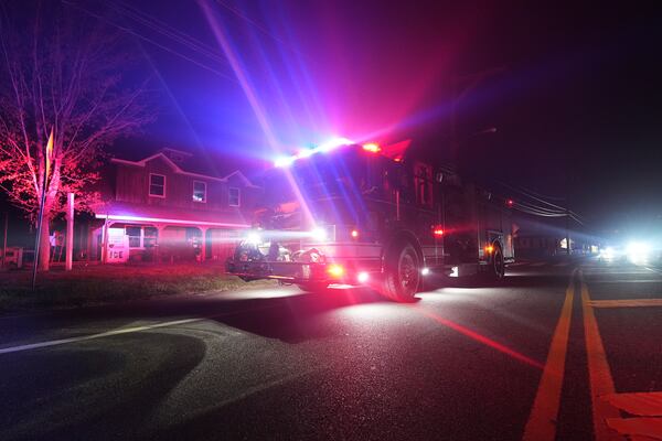 Firefighters respond to a wildfire on Tuesday, April 22, 2025, in Waretown, N.J. (AP Photo/Chris Szagola)