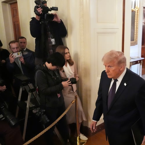 President Donald Trump, left, and Kevin Warsh arrive at a swearing-in ceremony for Warsh as Chairman of the Federal Reserve in the East Room of the White House, Friday, May 22, 2026, in Washington. (AP Photo/Alex Brandon)