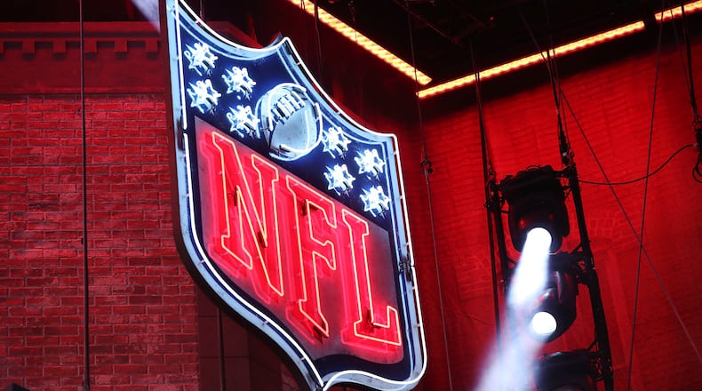 The NFL logo on the main stage during the second round of the NFL football draft, Friday, April 26, 2019, in Nashville.
