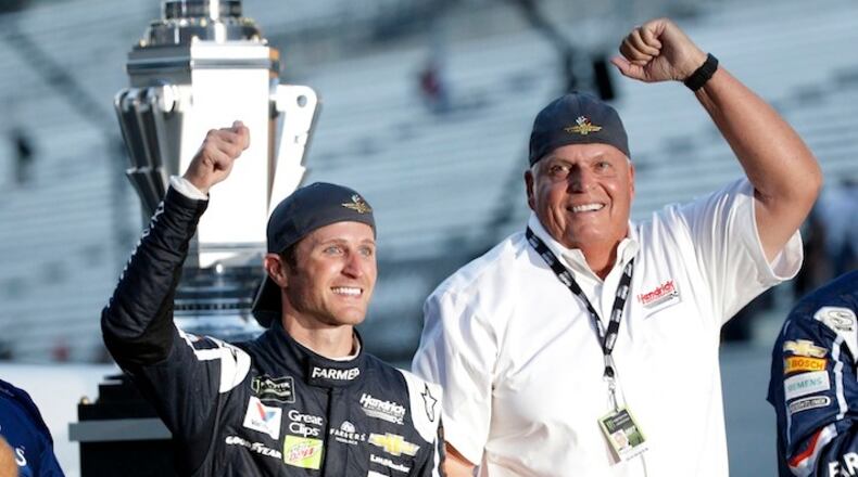 In this July 23, 2017, file photo, Kasey Kahne (5) celebrates with car owner Rick Hendrick after winning the NASCAR Brickyard 400 auto race at Indianapolis Motor Speedway in Indianapolis. Hendrick Motorsports and driver Kasey Kahne have agreed to part ways after six years. The team said in a statement Monday, Aug. 7, 2017, that Kahne has been released from the final year of his contract, allowing him to begin pursing a Monster Energy Cup ride for 2018.(AP Photo/AJ Mast, File)