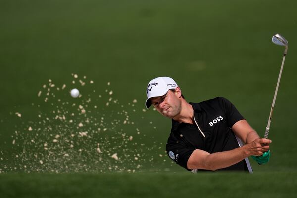 Thomas Detry, of Belgium, hits from the bunker on the second hole during the first round at the Masters golf tournament, Thursday, April 10, 2025, in Augusta, Ga. (AP Photo/George Walker IV)