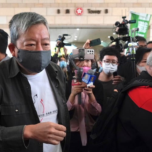 FILE - Pro-democracy activist Lee Cheuk-yan, center, arrives at a court in Hong Kong, April 16, 2021. (AP Photo/Kin Cheung, File)