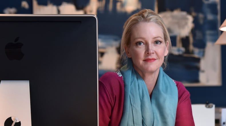 Portrait of Danielle Rollins at her office in December. Rollins has been enmeshed in a bitter legal dispute with her ex-husband Glen Rollins. HYOSUB SHIN / HSHIN@AJC.COM